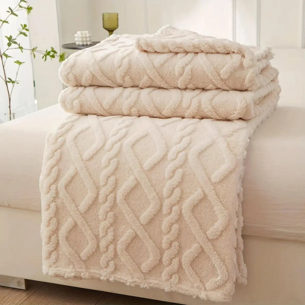 Coral Fleece Blanket, shown in a styled room