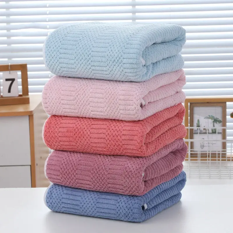 Coral Fleece Towel Set, shown in a styled room