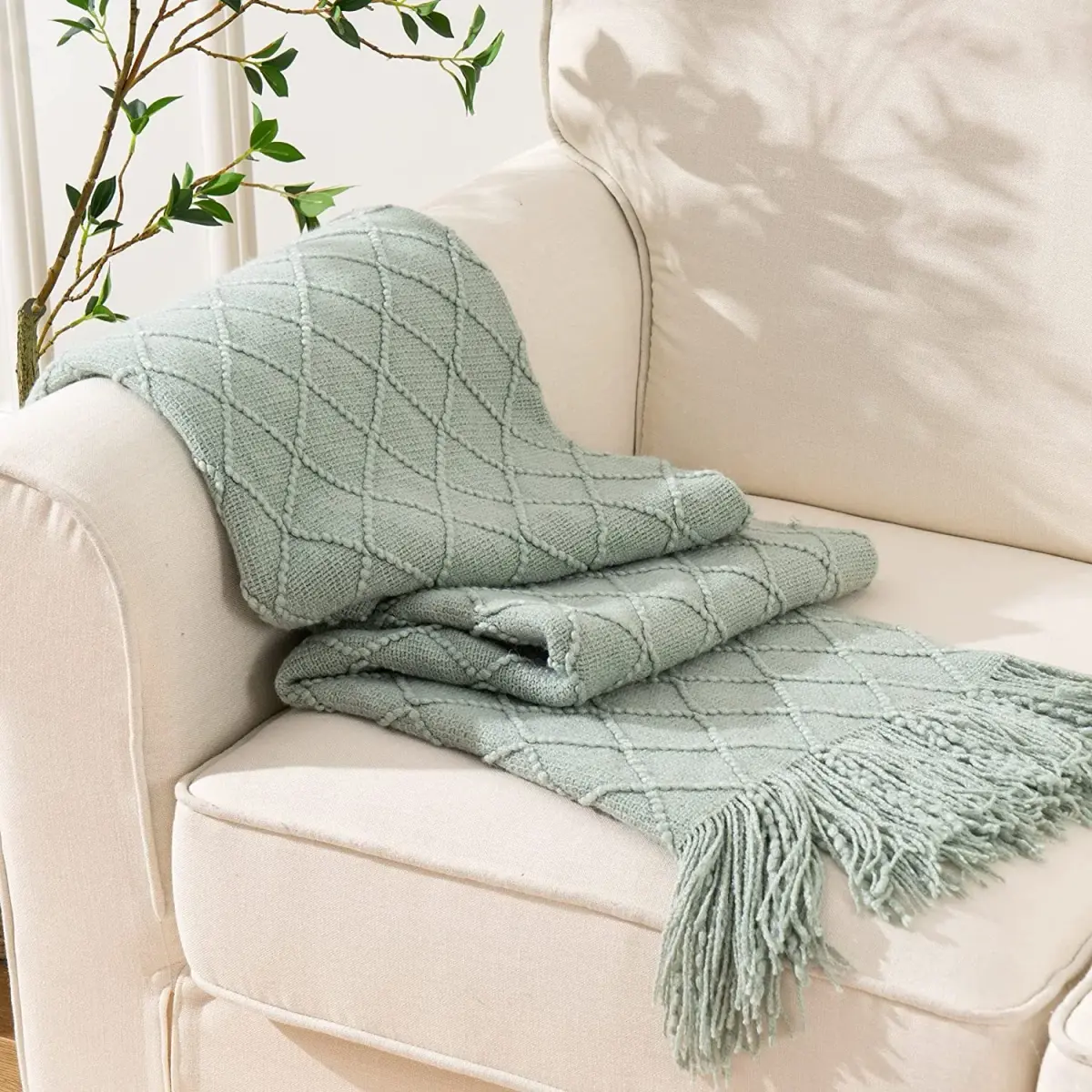 Oversized Knit Blanket, shown in a styled room