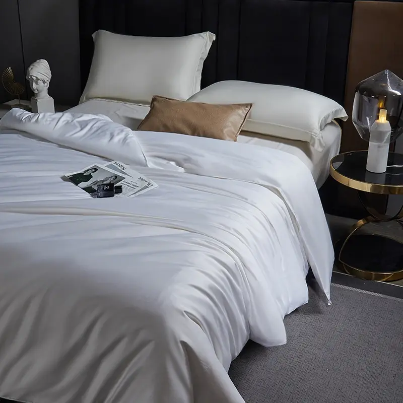 Handmade Summer Silk Quilt, shown in a styled room