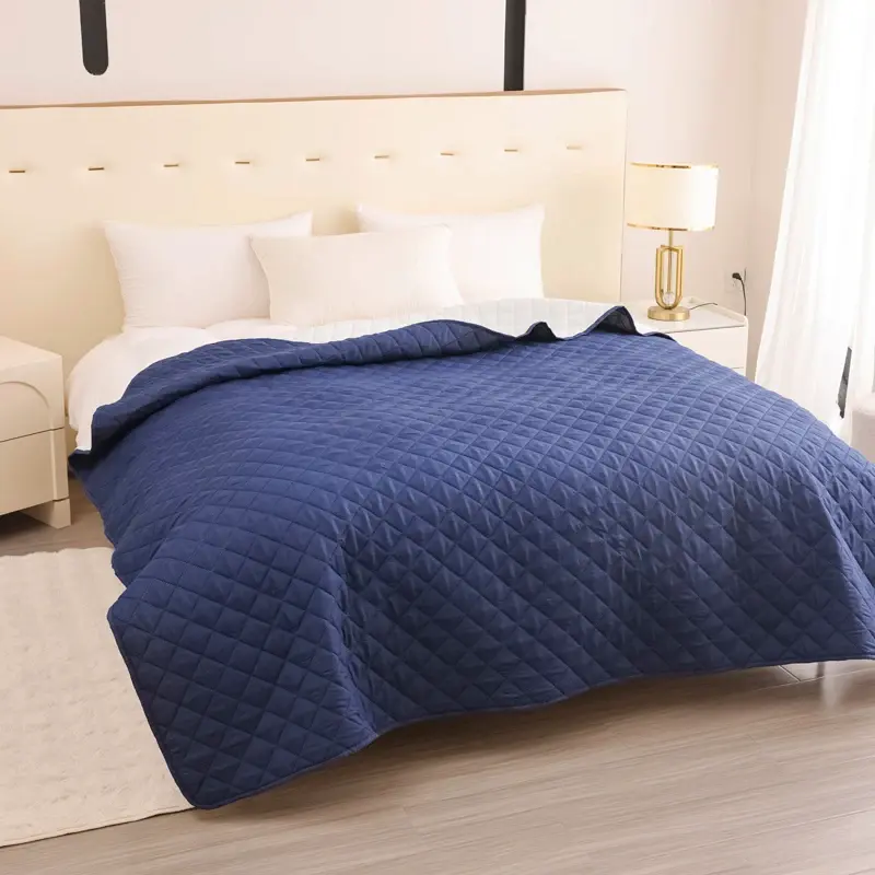 Quilted Waterproof Bed Protector, shown in a styled room